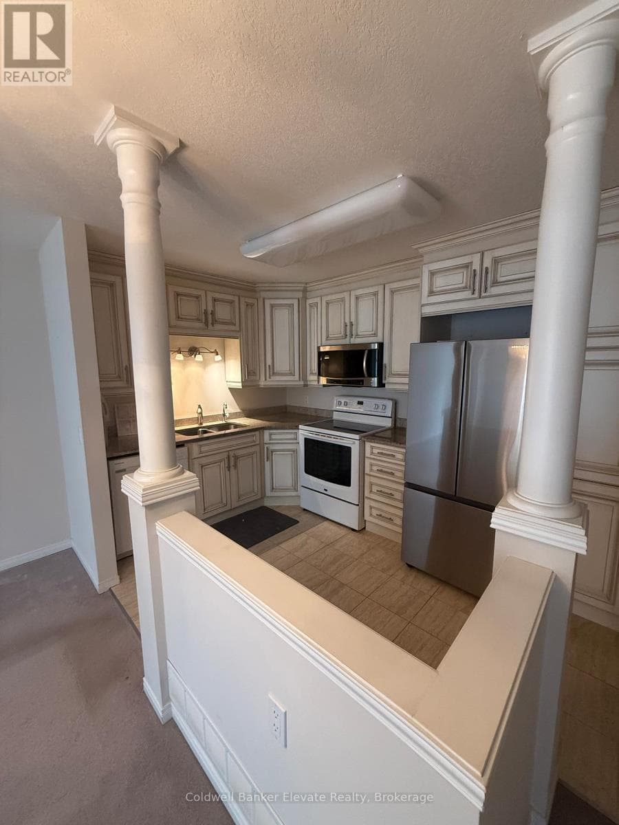 2705 Kingsway Drive Unit 9, Kitchener, Ontario N2C2T2 - Photo 2